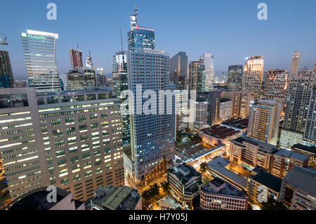 Makati Skyline at night. Makati is a city in the Philippines` Metro Manila region and the country`s financial hub. Stock Photo